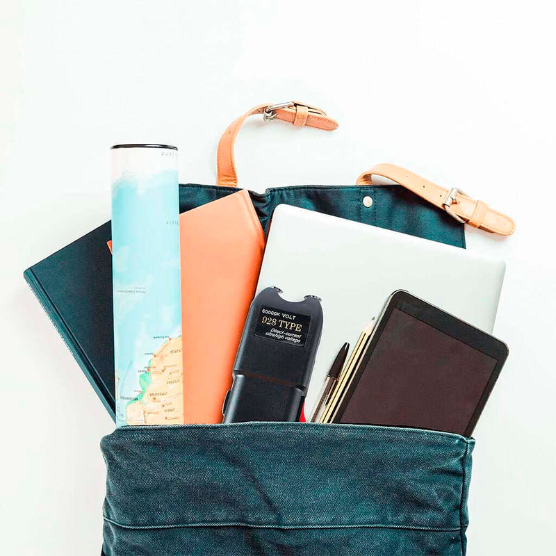 Dispositivo de choque Taser para defensa personal recargable con linterna LED TASER 928